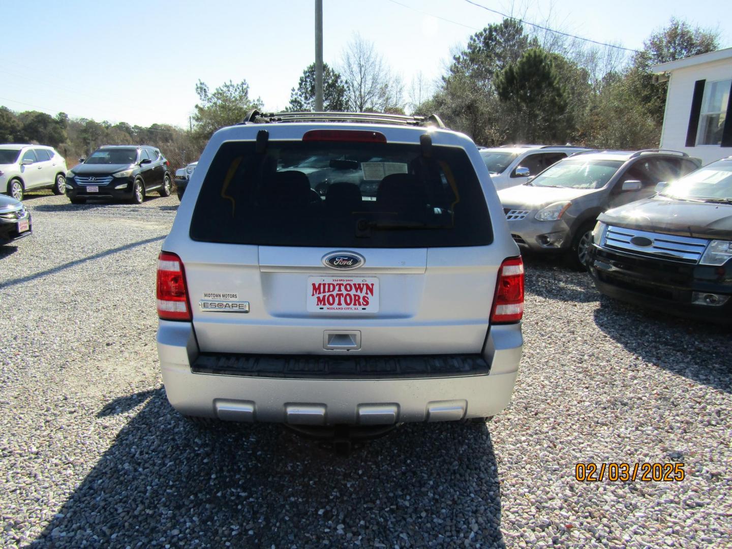 2011 Silver Ford Escape XLS FWD (1FMCU0C75BK) with an 2.5L L4 DOHC 16V engine, Automatic transmission, located at 15016 S Hwy 231, Midland City, AL, 36350, (334) 983-3001, 31.306210, -85.495277 - Photo#9