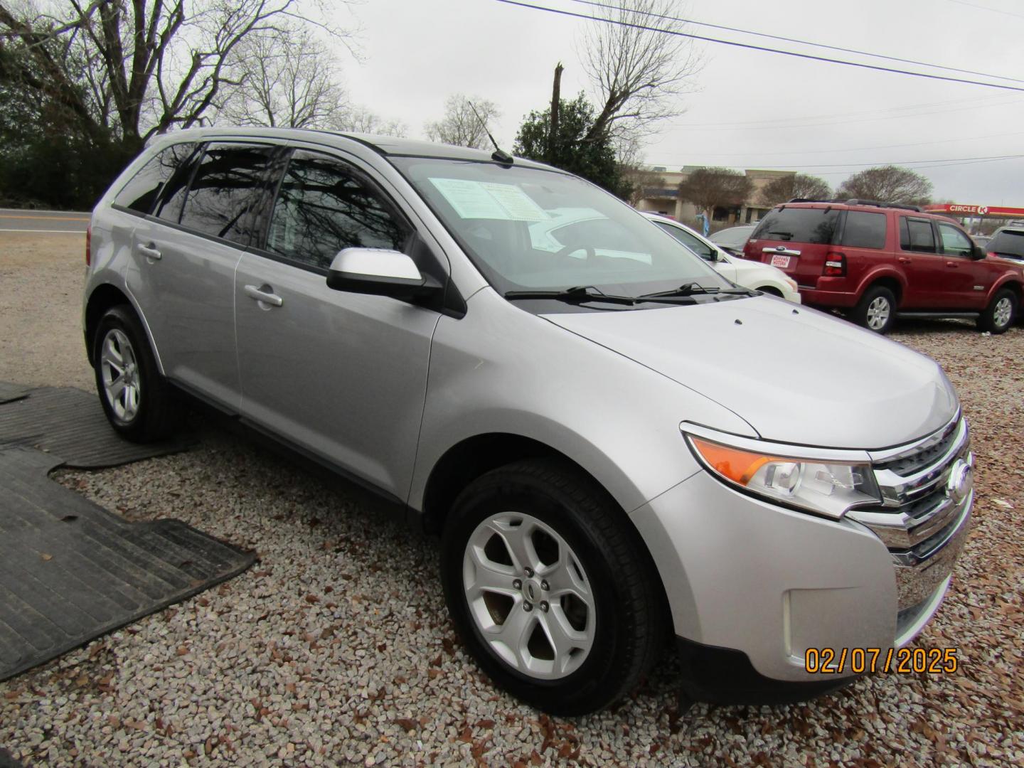 2013 Silver Ford Edge SEL FWD (2FMDK3JC5DB) with an 3.5L V6 DOHC 24V engine, Automatic transmission, located at 15016 S Hwy 231, Midland City, AL, 36350, (334) 983-3001, 31.306210, -85.495277 - Photo#0