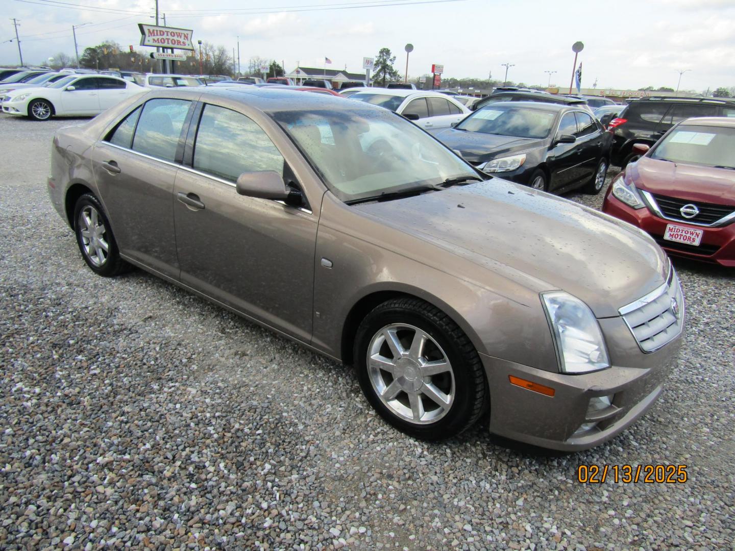 2006 Beige Cadillac STS V6 (1G6DW677860) with an 3.6L V6 DOHC 24V engine, Automatic transmission, located at 15016 S Hwy 231, Midland City, AL, 36350, (334) 983-3001, 31.306210, -85.495277 - Photo#0