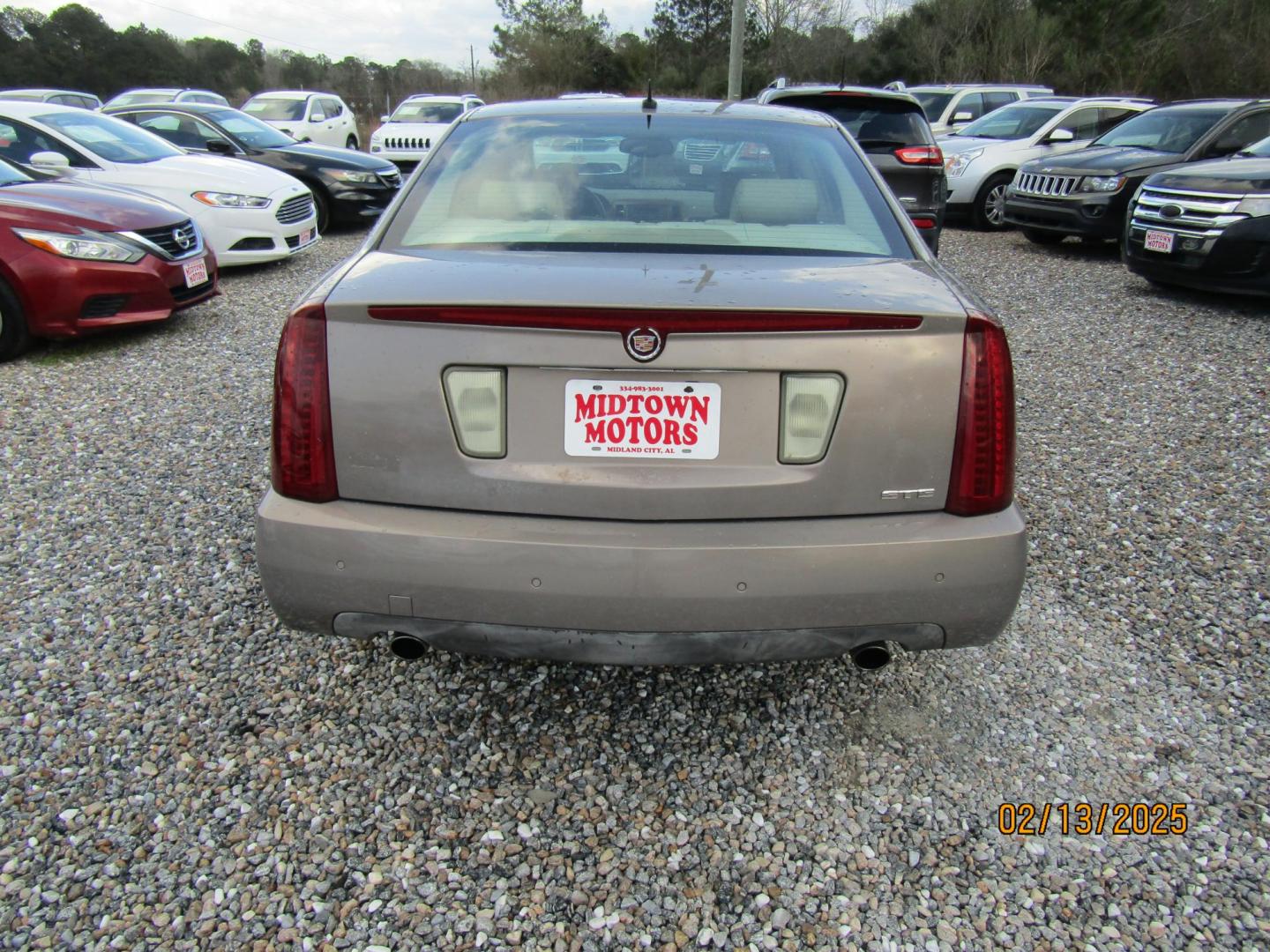 2006 Beige Cadillac STS V6 (1G6DW677860) with an 3.6L V6 DOHC 24V engine, Automatic transmission, located at 15016 S Hwy 231, Midland City, AL, 36350, (334) 983-3001, 31.306210, -85.495277 - Photo#7