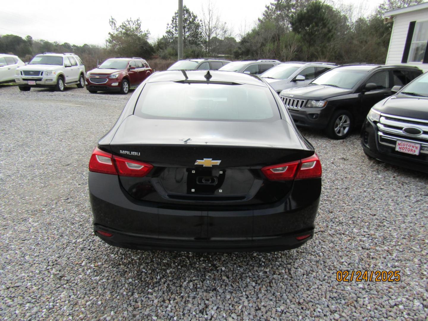 2017 Black Chevrolet Malibu LS (1G1ZB5ST6HF) with an 1.5L L4 DOHC 16V engine, Automatic transmission, located at 15016 S Hwy 231, Midland City, AL, 36350, (334) 983-3001, 31.306210, -85.495277 - Photo#5