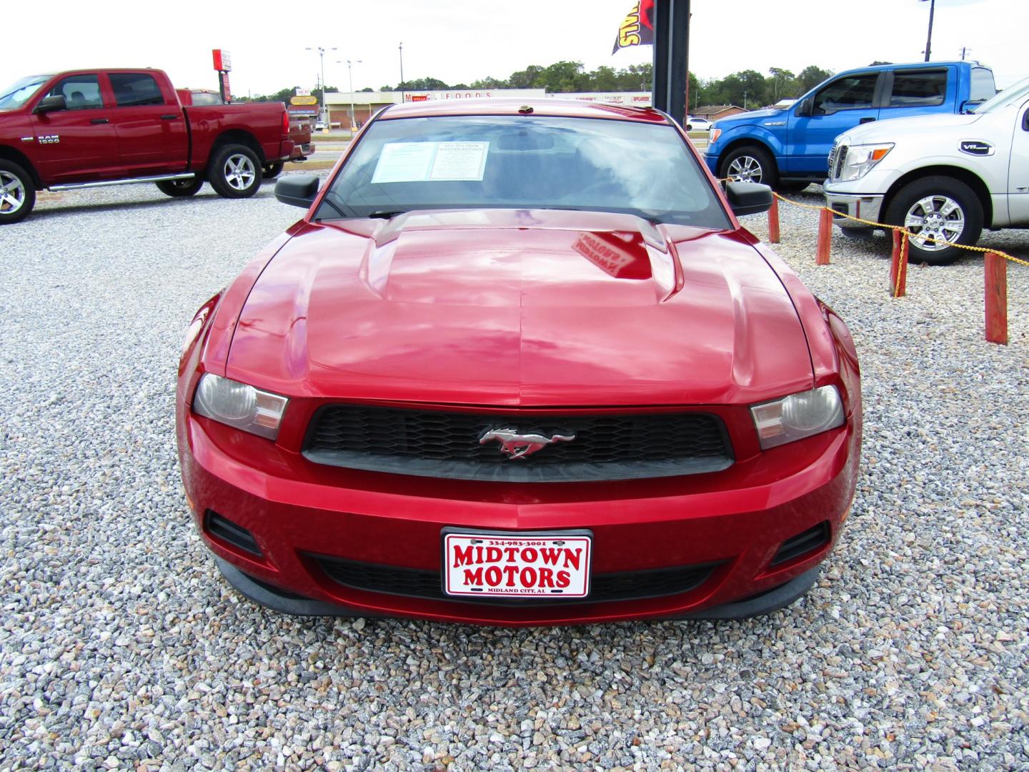 2011 Red /Black Ford Mustang (1ZVBP8AM4B5) with an V6 Cylinder Engine engine, Automatic transmission, located at 15016 S Hwy 231, Midland City, AL, 36350, (334) 983-3001, 31.306210, -85.495277 - Photo#1