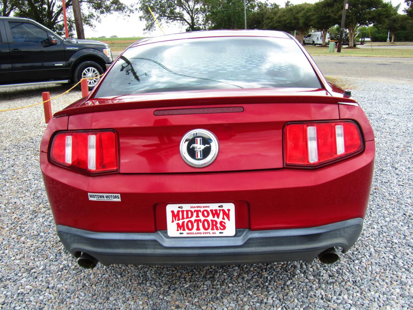 2011 Red /Black Ford Mustang (1ZVBP8AM4B5) with an V6 Cylinder Engine engine, Automatic transmission, located at 15016 S Hwy 231, Midland City, AL, 36350, (334) 983-3001, 31.306210, -85.495277 - Photo#4